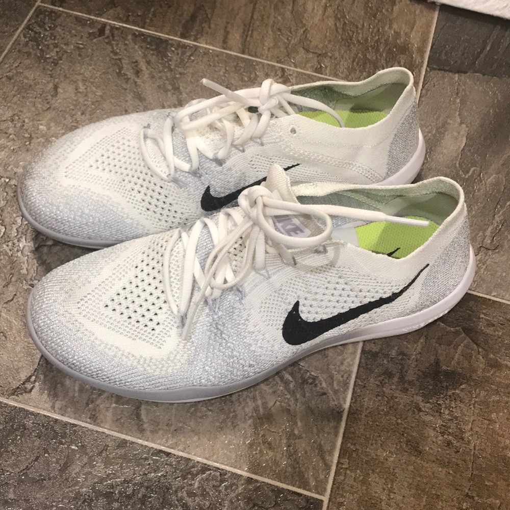 White and black nike tennis shoes